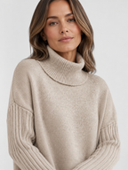 Women’s Oversized Turtleneck Sweater with Asymmetric Hem
