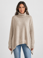 Women’s Oversized Turtleneck Sweater with Asymmetric Hem